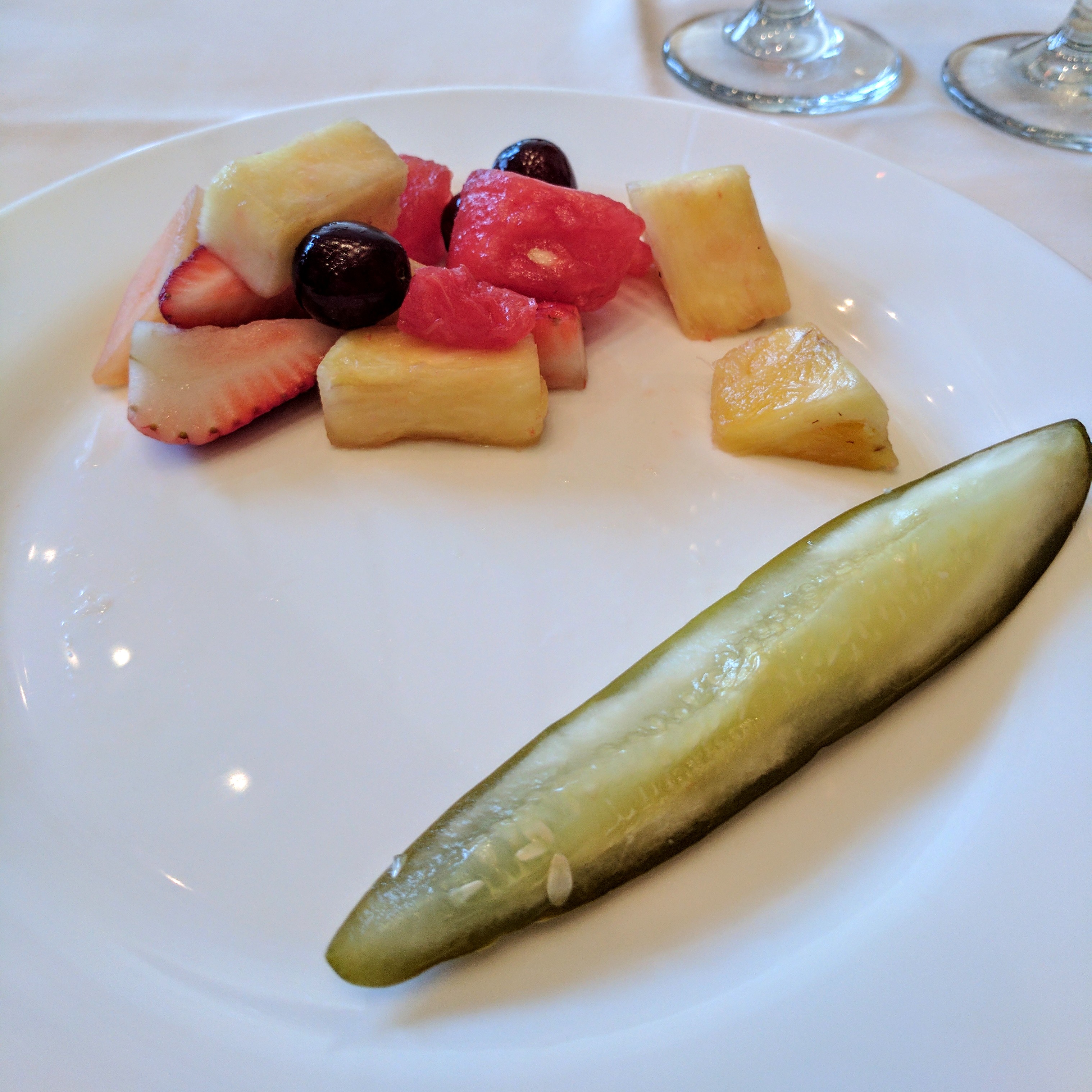 A pickle and some fruit
